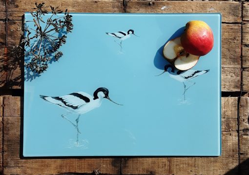 Avocet glass chopping board with sliced fruit