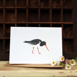 A6 card featuring a Oystercatcher and flowers