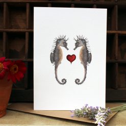 A6 card featuring 2 Seahorses with heart and flowers