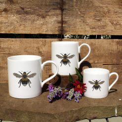 3 mugs featuring the Bee design with flowers