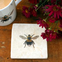Marble Bee coaster with mug and flowers