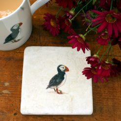 Marble Puffin coaster with mug and flowers