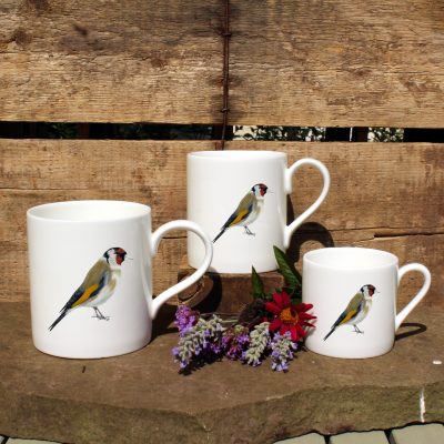 3 mugs featuring the Goldfinch design with flowers