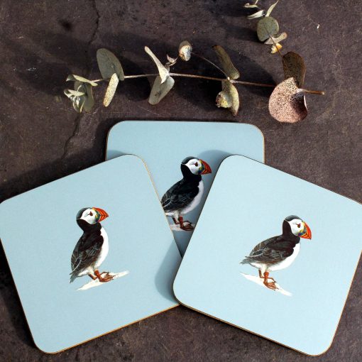 Three Puffin coasters with flowers