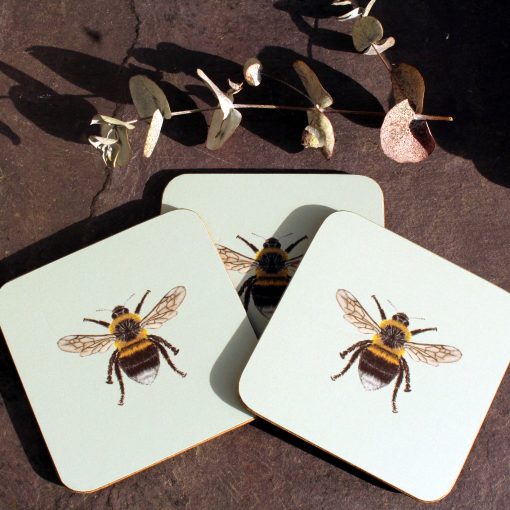 Three Bee coasters with flower