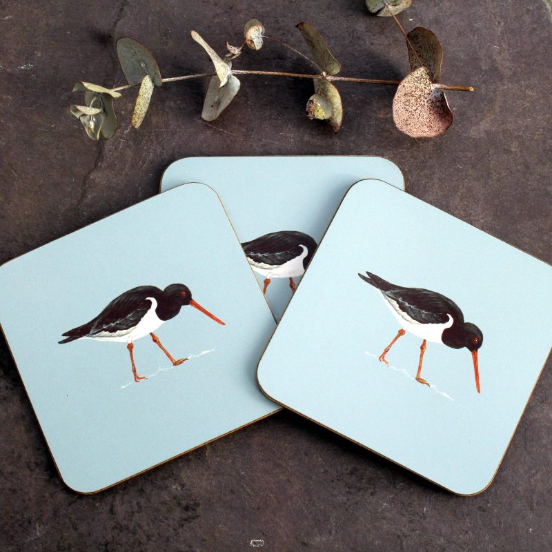 Three Oystercatcher coasters with flower