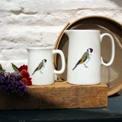 Two sized jugs featuring the Goldfinch design with flowers
