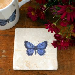 Marble Holly Blue coaster with mug and flowers