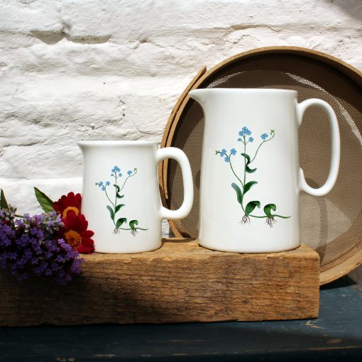 Two sized jugs featuring the Water forget me not design with flowers