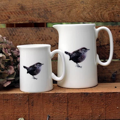 Two Wren jugs with flower