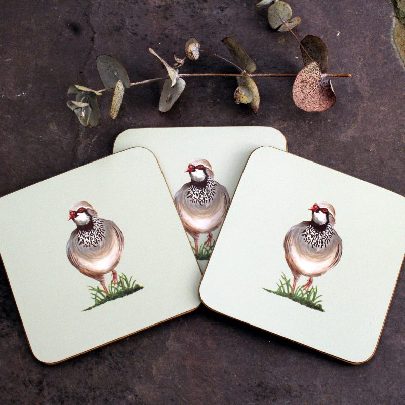 Three Partridge coasters with flower