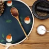 Christmas Robin AGA with wooden spoon